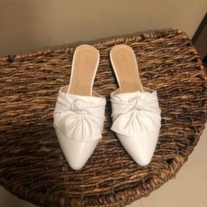 white slip on shoes with bow